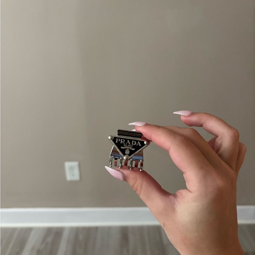Prada Black and Silver Triangle Pin